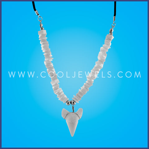 BLACK CORD NECKLACE WITH WHITE FIMO CHIPS AND IMITATION SHARK TOOTH PENDANT  Comes with assorted shark teeth.