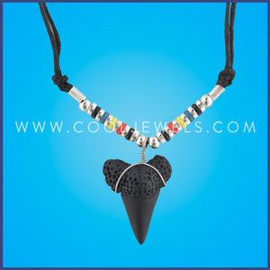 BLACK SLIDER CORD NECKLACE WITH BEADS AND BLK IMITATION SHARK TOOTH Comes with assorted shark teeth.